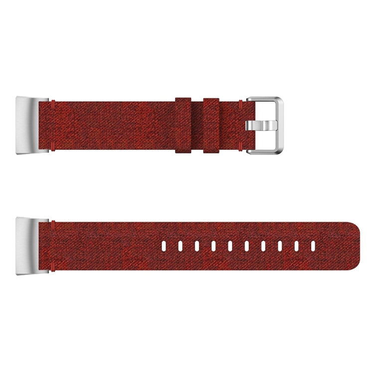 Dark red woven nylon watch band with rectangular metal buckle and adjustment holes