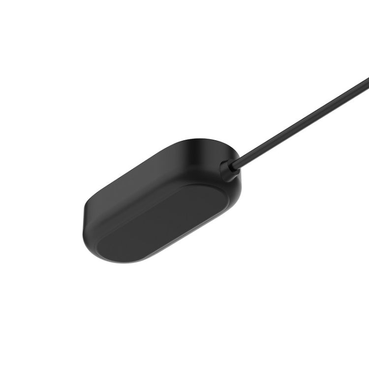 Black magnetic charging dock cradle end on the charging cable
