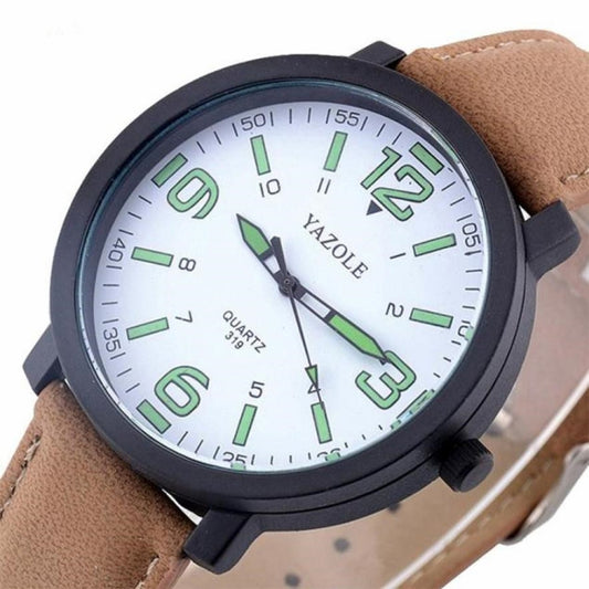 Men's quartz watch close-up: black bezel, brown leather strap, luminous green dial