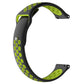 Two-tone silicone watch band in black and neon green with oval perforation pattern
