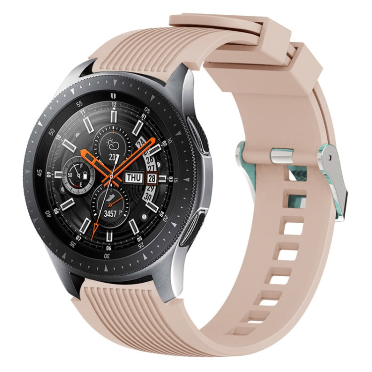 Beige silicone watch band with vertical grain ridges and side buckle holes
