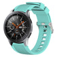 Mint green silicone watch band with vertical grain ridges and side buckle holes