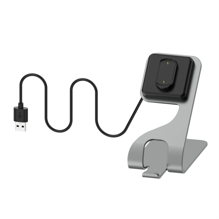 Silver/grey charging stand with magnetic dock, USB cable, and watch holder