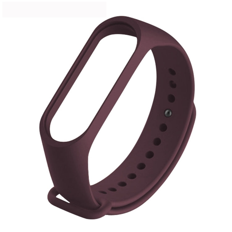 Soft TPU watch band with pin buckle, wine red strap with oval adjustment holes.