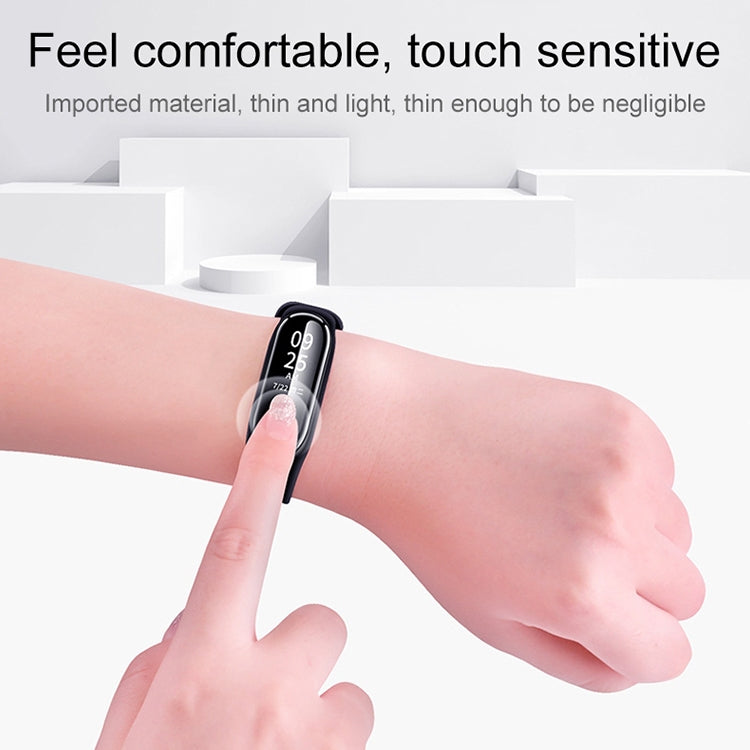 Clear PET screen protector film on fitness tracker display, touch-friendly surface