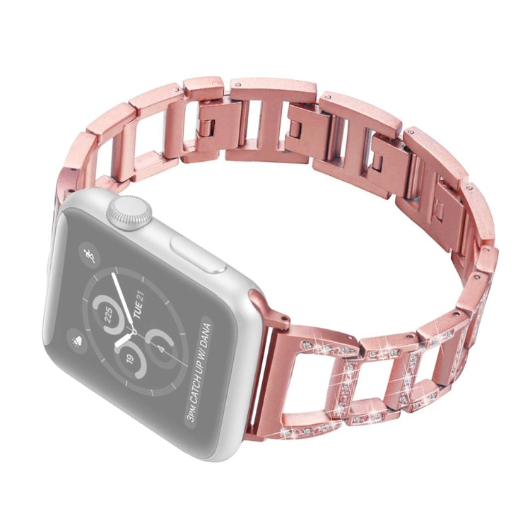 Rose gold stainless steel watch band with diamond-cut rectangular links and metal buckle