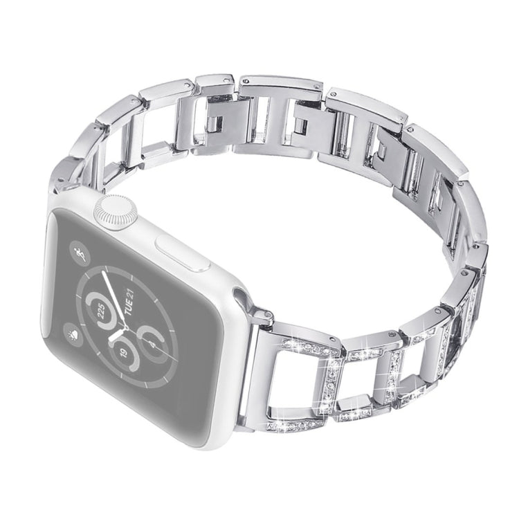Silver stainless steel watch band with diamond-cut rectangular links and metal buckle