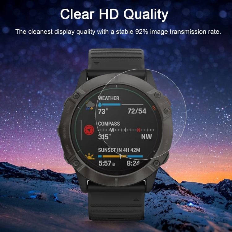 Clear 2.5D tempered glass screen protector on black Garmin smartwatch display