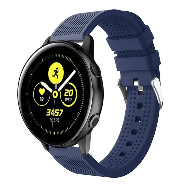 Dark blue silicone smartwatch band with perforated strap and metal buckle hardware