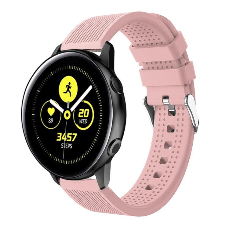 Light pink silicone smartwatch band with perforated strap and metal buckle hardware