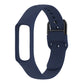 Dark blue silicone watch band with metal clasp and perforation holes for smartwatch, side view.