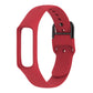 Red silicone smartwatch band with metal clasp and adjustment holes, side profile view.