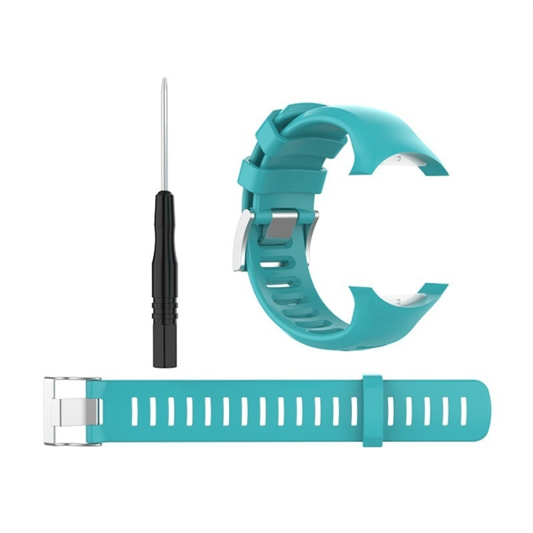 Teal silicone watch band with spring-bar tool, showing strap adjustment hardware