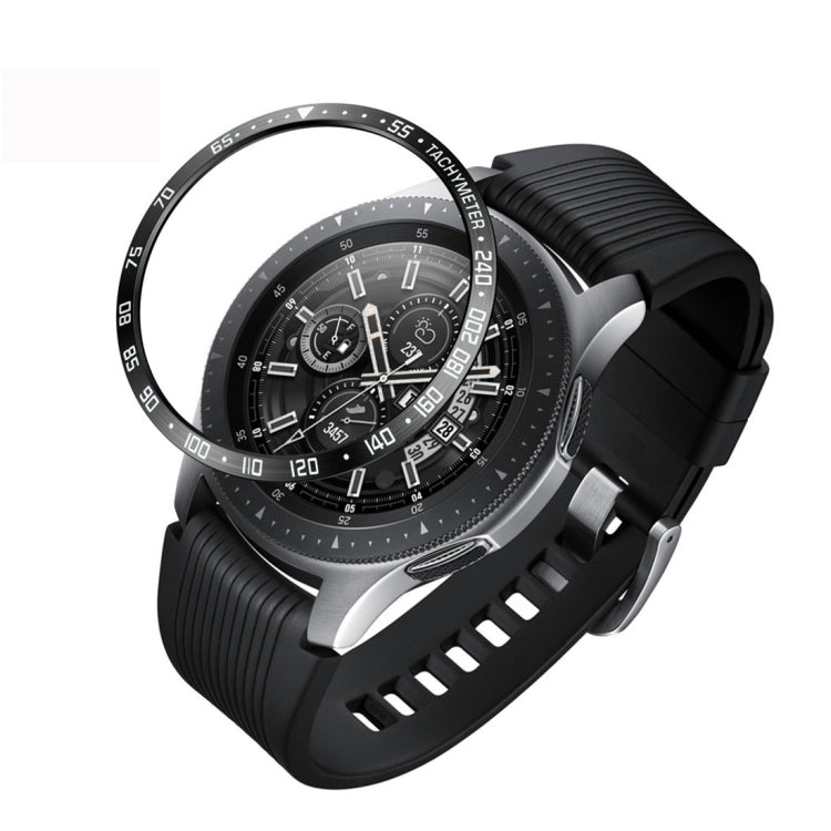 Black smartwatch with steel protective frame bezel and clear ring cover, on black silicone band