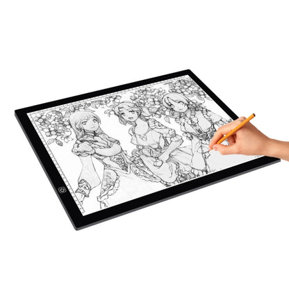 LED USB light drawing pad with black frame, anime line art, and stylus in use