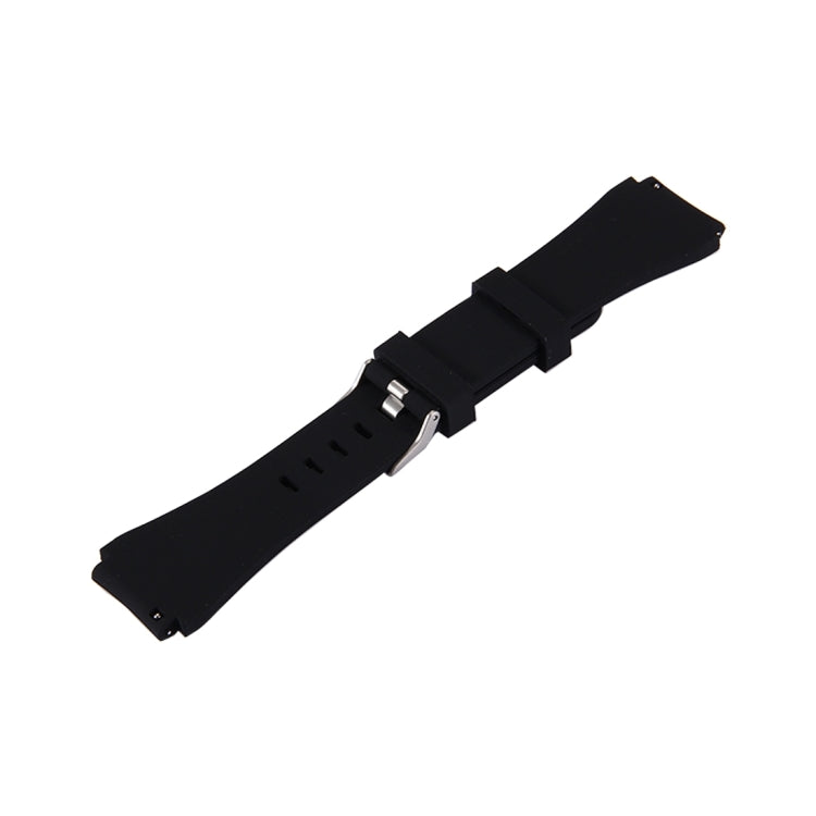 Black silicone watch band with metal buckle and strap holes, laid flat
