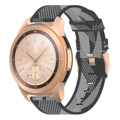 Grey nylon stripe-weave watch band with buckle and stitched adjustment holes