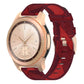 Red nylon stripe-weave watch band with metal buckle and stitched adjustment holes