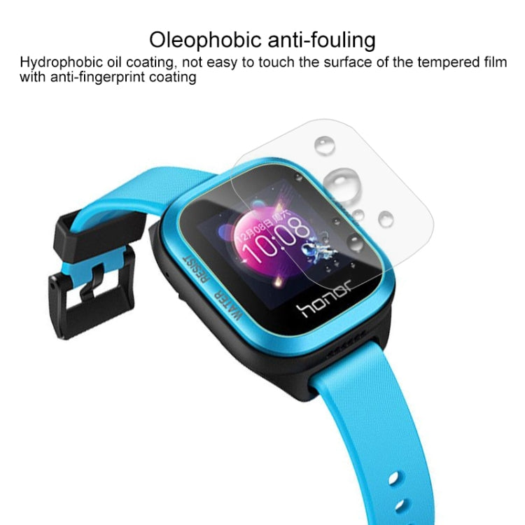 Transparent tempered glass screen protector with water droplets on blue kids smartwatch screen