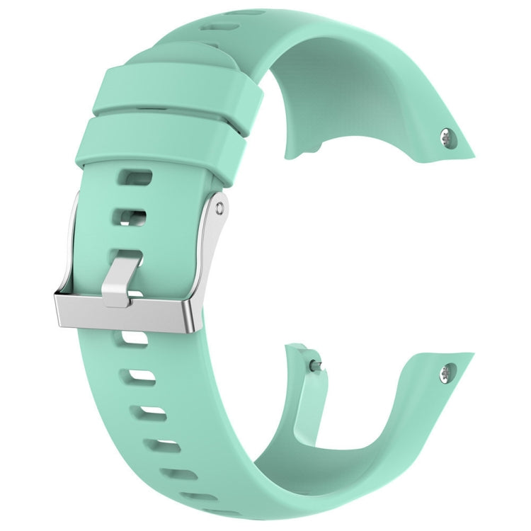 Mint green silicone watch band with metal clasp and punched strap holes.