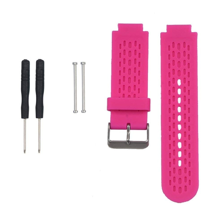 Pink silicone sport watch band with perforated strap and metal buckle.