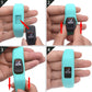 Teal silicone sport watch band installation shown with watch face attached