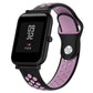 Silicone sport watch band with black and pink perforated straps, black watch case
