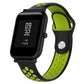 Silicone sport watch band with black and lime green perforated straps, black watch case