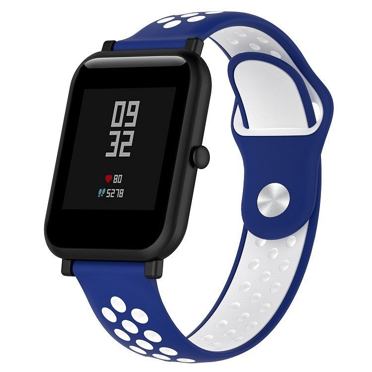Silicone sport watch band with blue and white perforated straps, black watch case