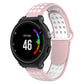 Silicone sport watch band in pink and light gray, with perforated oval ventilation holes