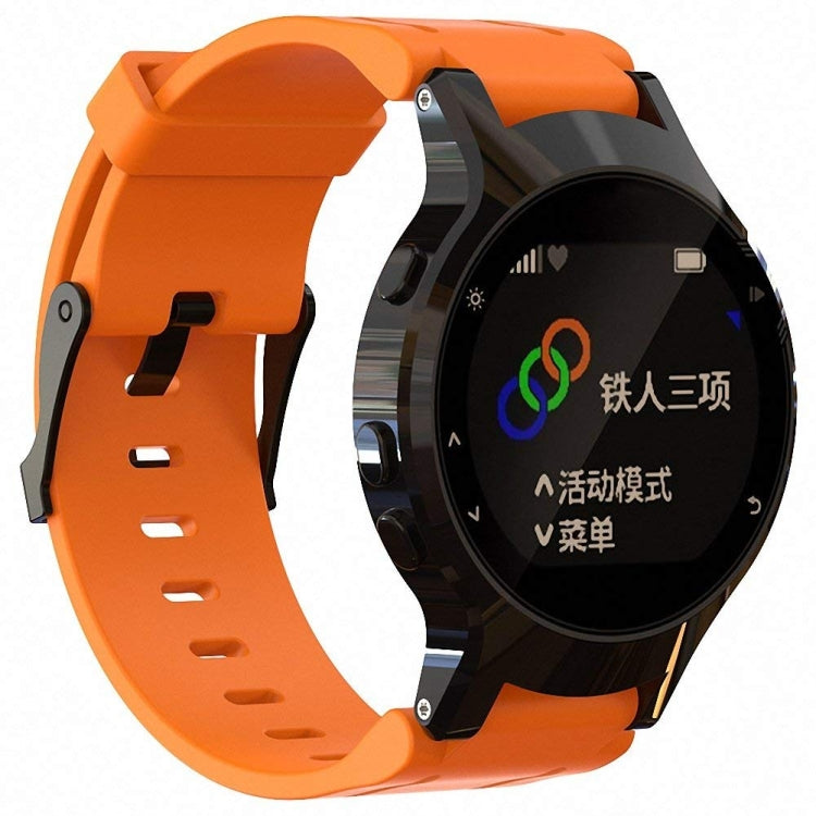 Orange silicone sport watch band with perforated strap and black watch holder.