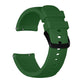 Dark green silicone watch band with textured ends, metal pins, and perforated adjustment strip