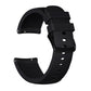 Black silicone watch band with textured strap ends, metal pins, and adjustable buckle holes