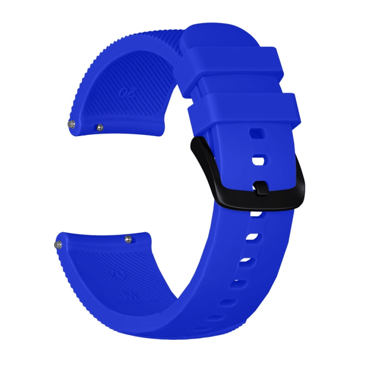 Blue silicone watch band with textured strap ends, metal pins, and buckle holes