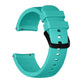 Mint green silicone watch band with textured ends, metal pins, and adjustable holes
