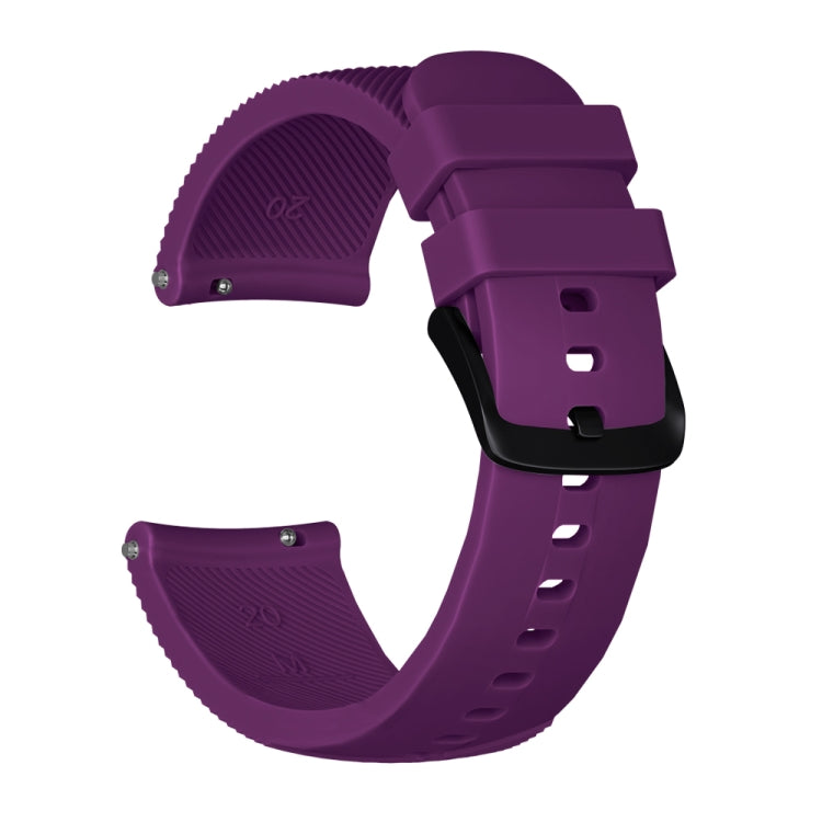 Purple silicone watch band with textured strap ends and buckle clasp with adjustment holes