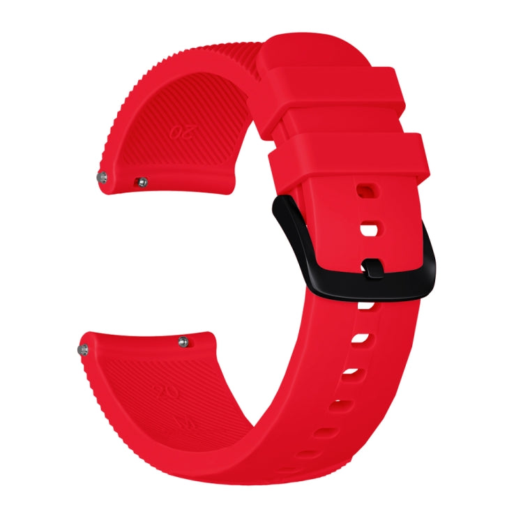 Red silicone watch band with textured strap ends and buckle clasp with adjustment holes