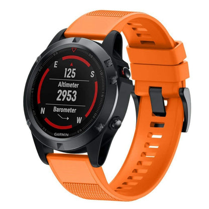 Orange silicone watch band with perforated texture and snap clasp for 22mm watches