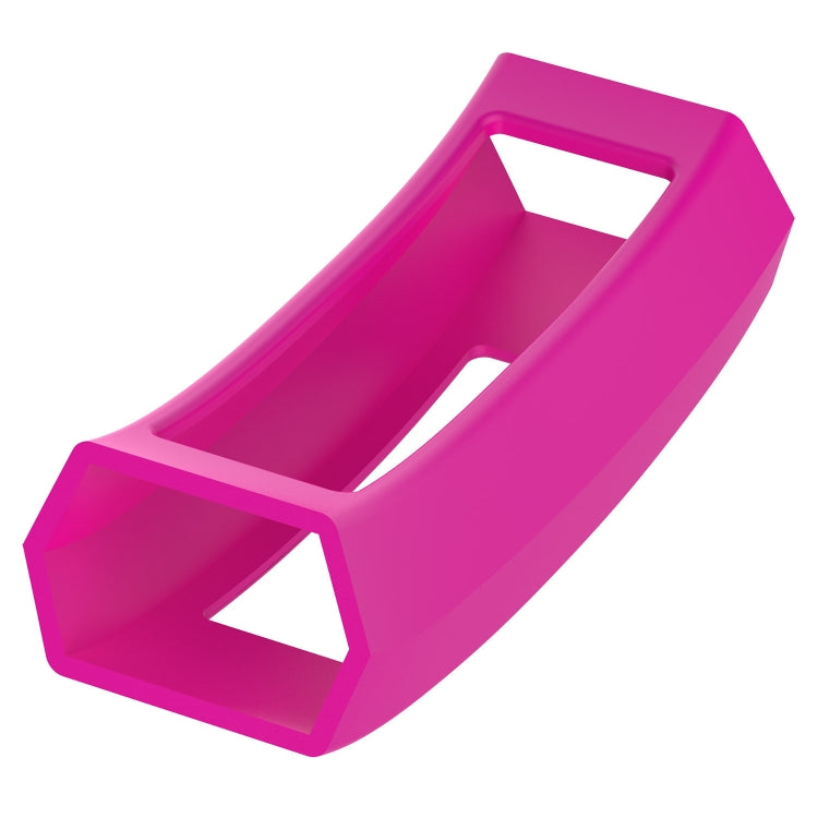 Pink silicone watch protective case with central slot and raised edges.