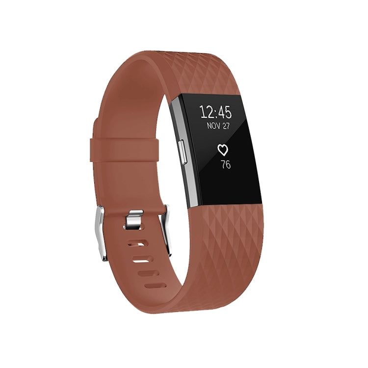Brown diamond-pattern sport watch band with perforations and metal buckle, side view.