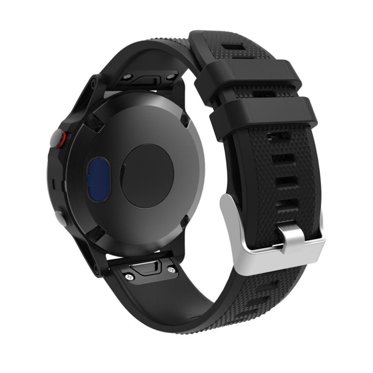 Charging port dustproof silicone stopper plug on smartwatch, blue accent