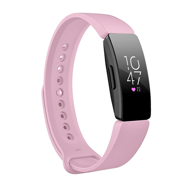 Light pink silicone watch band with perforated strap and black smartwatch display