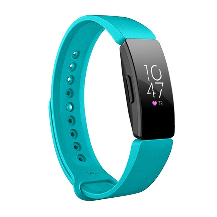 Teal silicone watch band with perforated strap and black smartwatch display
