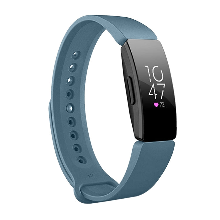 Blue-gray silicone watch band with perforated strap and black smartwatch display