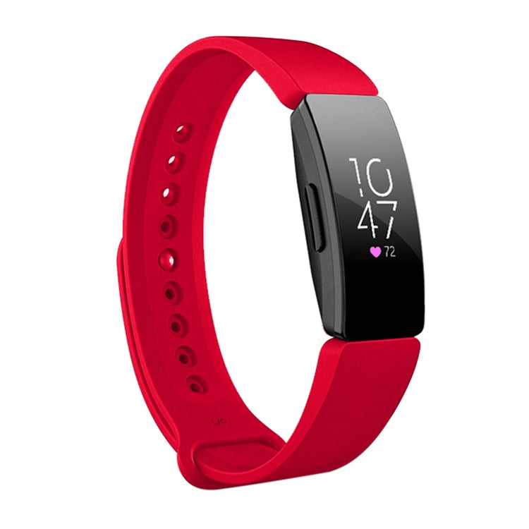 Red silicone watch band with perforated strap and black smartwatch display