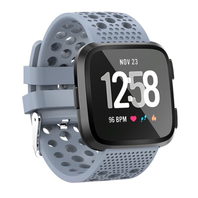 Baby blue vented watch band for Fitbit Versa with perforated holes and clasp
