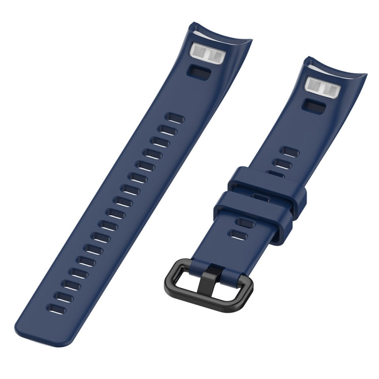 Blue silicone watch band with adjustable clasp and rows of vent holes