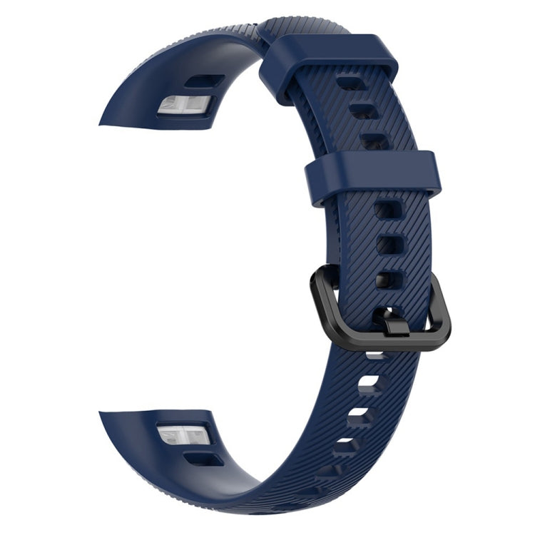 Blue silicone smartwatch band with adjustable buckle and perforated link holes