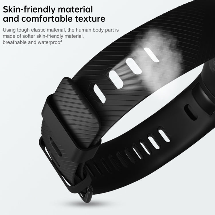 Black silicone watch band with textured surface and adjustable buckle