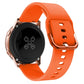 Orange silicone watch band with metal buckle and vented strap holes